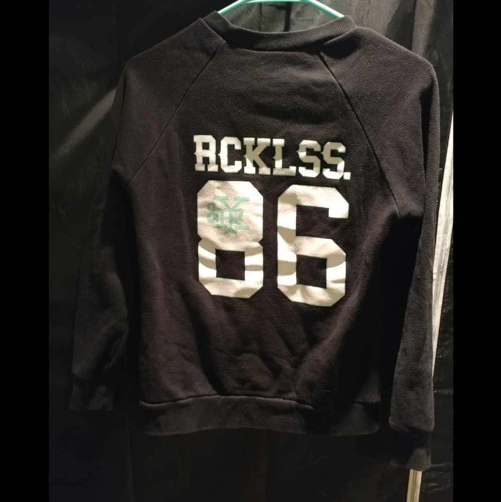 Young and reckless crewneck